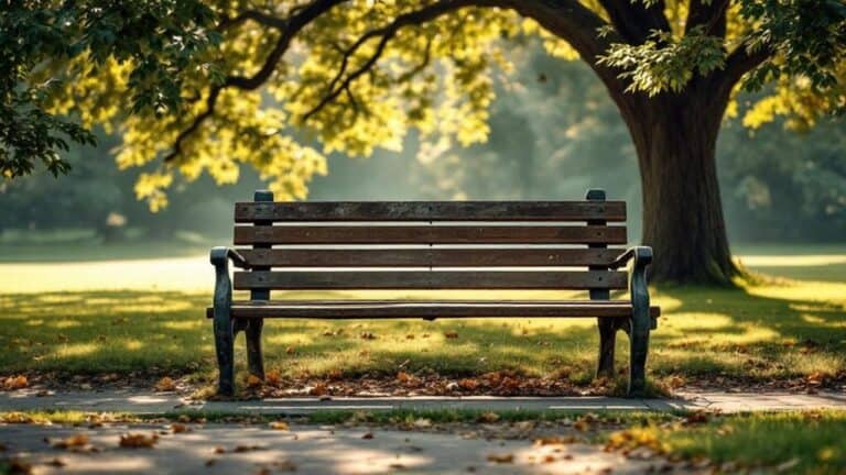 Serene park bench under a large, leafy tree on a sunny day, inspiring relaxation and mindfulness.